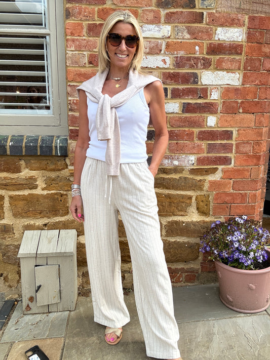 Larry Stone pin-striped trousers